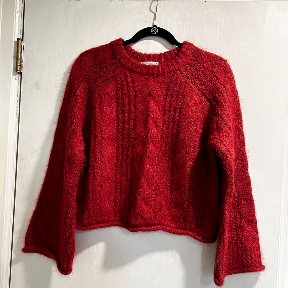 Red cable knit sweater